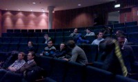 Attendees sitting in an auditorium during the SQL Server User Group Norway 2014 January event.